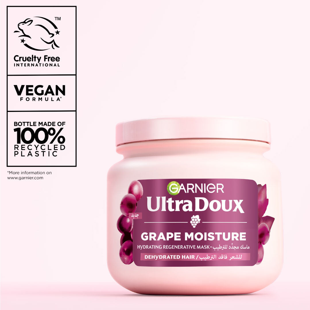 Garnier Ultra Doux Grape Moisture hair mask jar with branding and sustainability information on a white background