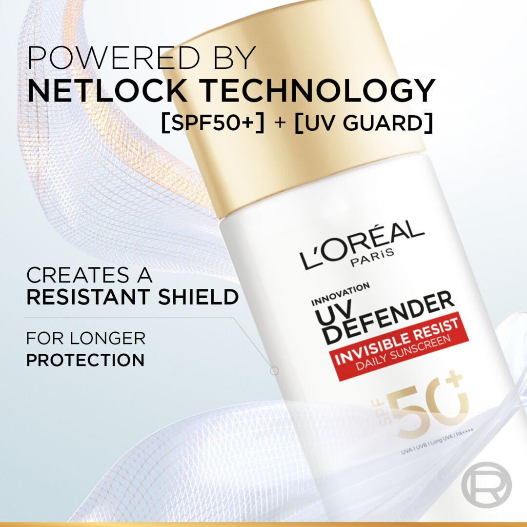 L'Oreal UV Defender sunscreen bottle with text about Netlock technology on a light background